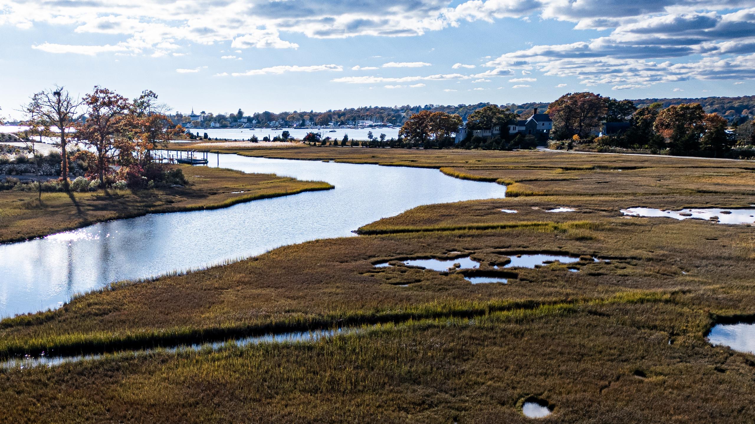 The estuary behind the house: its channels wind out to the river and on to Fishers Island Sound.