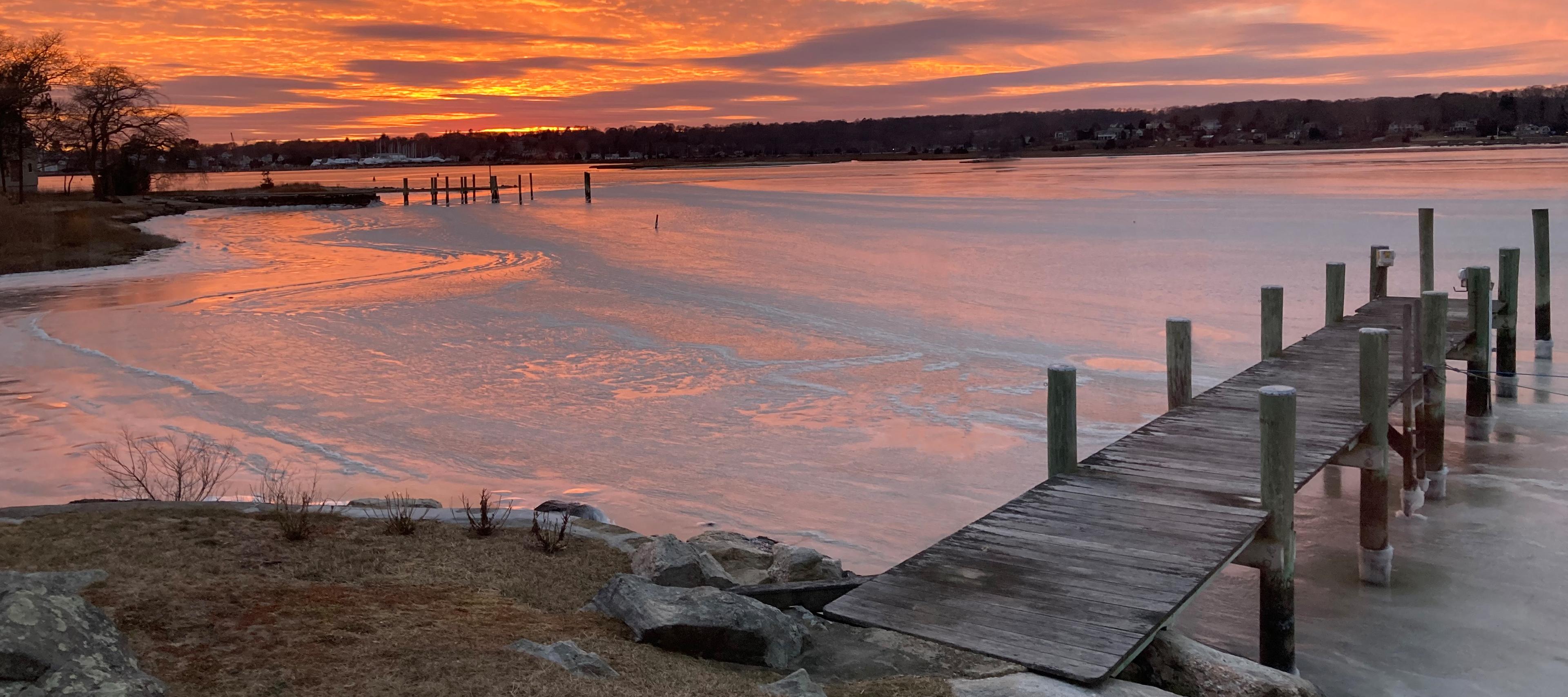 Sunset over the Mystic River from the dock at 26 Schoolhouse
